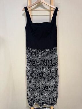 B. Right Black Square-Neck Midi Dress with White Floral Lace